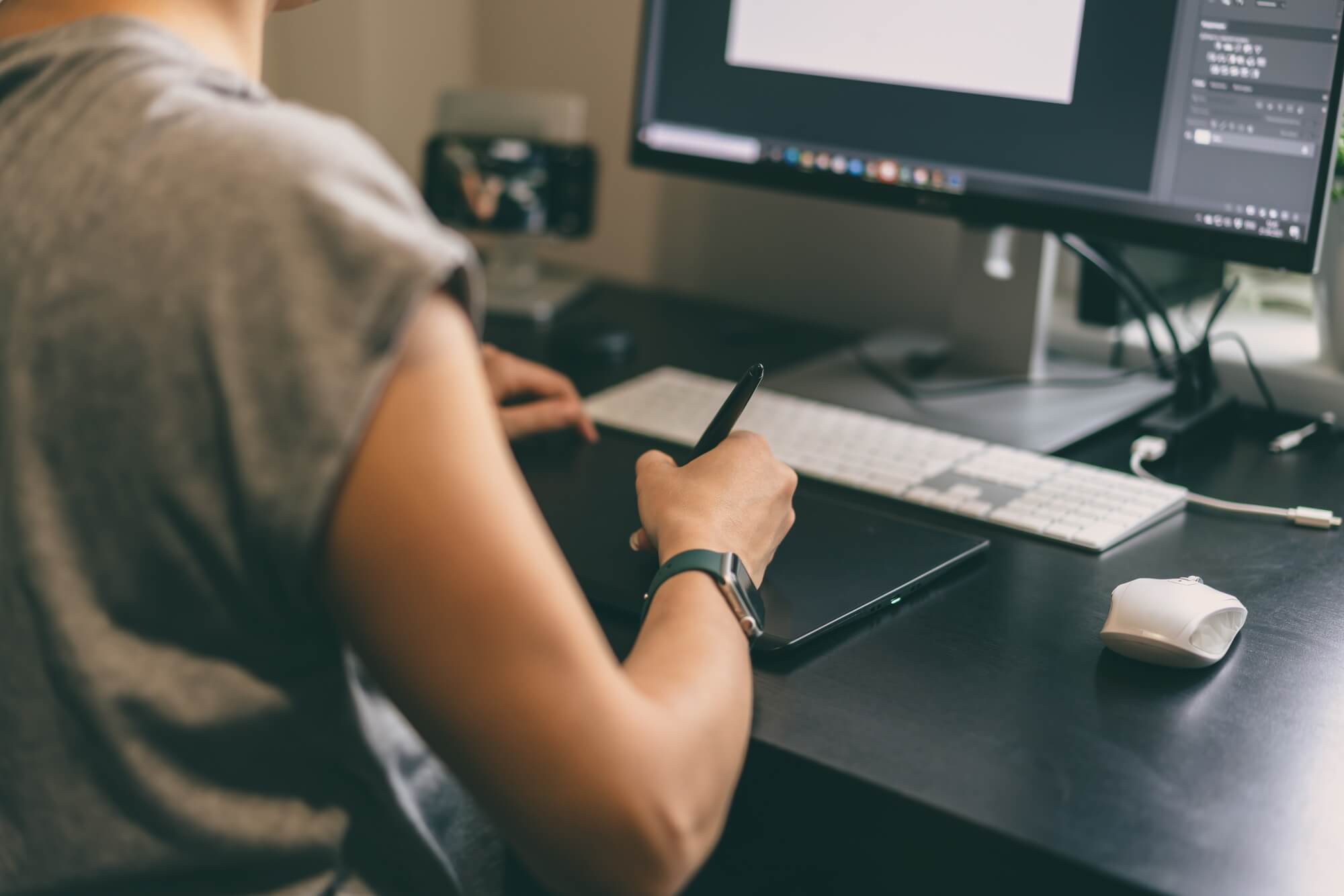 Team of Verge staff sitting around a table
